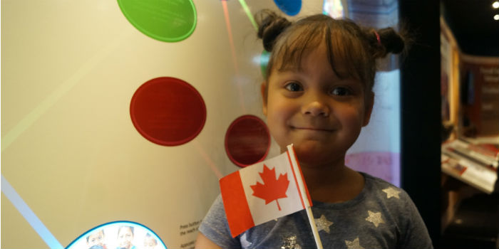 A child enjoys the Together exhibit at our stop in Camrose, AB.